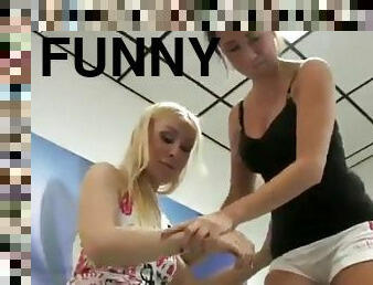 Two girls have fun trampling a guy