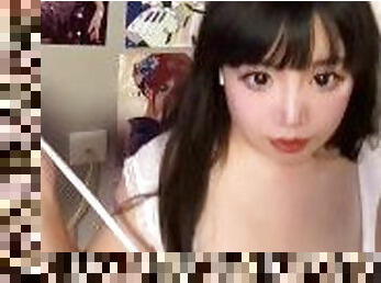 Naughty Asian girl wants to show you her natural big tits