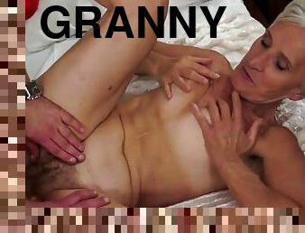 Bleach blonde granny takes an orgasmic ride on a hung studs cock