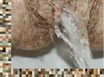 Delicious hairy pussy pissing mega close up