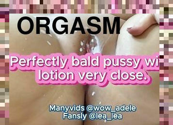 Perfectly bald pussy with lotion very close