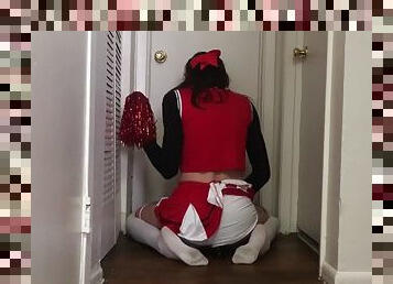 The cheerleader loves to ride her dildo
