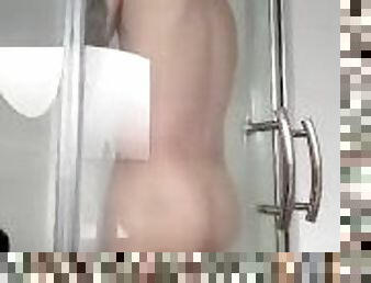 White boy taking a shower