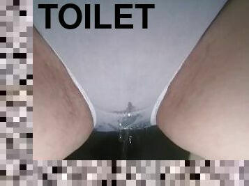 Pee wetting my white panties in toilet