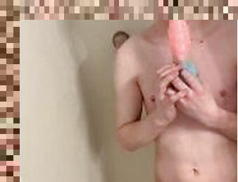 Femboy twink fucks dildo in shower