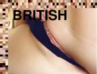 British slut plays with pierced pussy