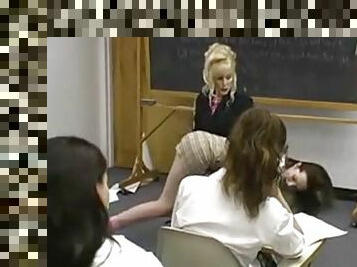 Girl is spanked in front of the class