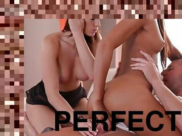 Two perfect girls play with a hard penis