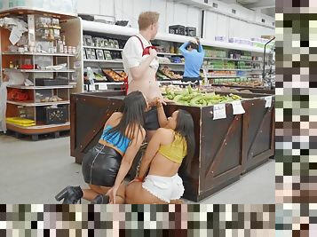 Pair of slutty brunettes pleasuring Jimmy in the grocery store
