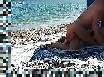 French Milf Fucks on Nude Beach public to stranger with cum