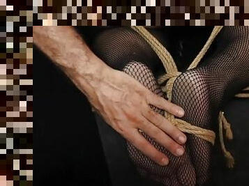 Feet whipping in fishnet