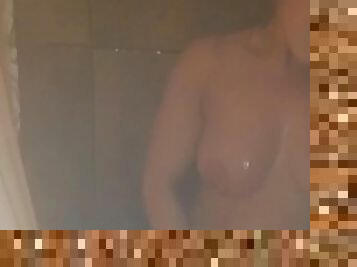 Milf masturbates in the shower