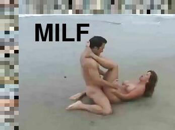 milf with huge boobs fucking in the beach