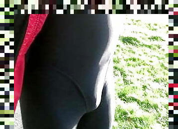 Out in thong leotard and leggings. 