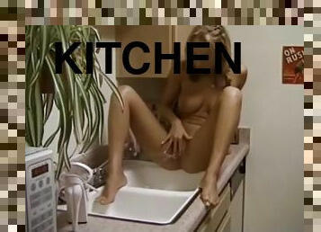 Blonde kitchen sink pee