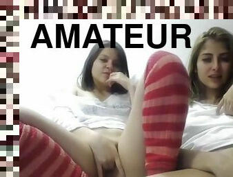 Two girls masturbate together