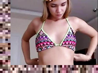 Bikini babe dances and strips on cam