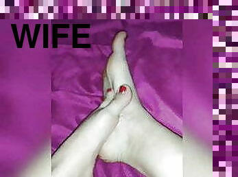 My wife play with her feet