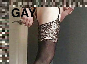 Crossdresser cums dressed in body stocking while toying ass