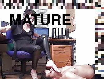 foot slave of mature mistress in home office