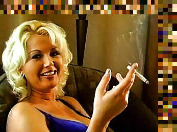 Outstanding blonde smoking in a sexy way