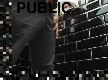 peeing in a public black toilet