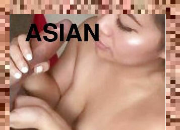 beautiful Asian girl giving head