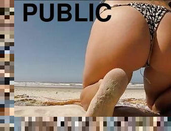 SLUT PISSING IN THE BEACH