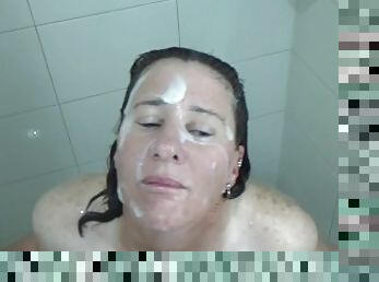 MILF gets surprised in shower & covered with big thick creamy facial