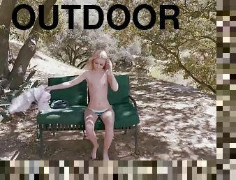 Blonde beauty has her coochie filled with a thick dong outdoors