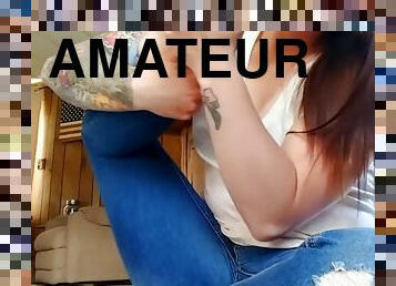 Inked Brunette In Blue Jeans Sitting On The Carpet Sucking Her Own Toe