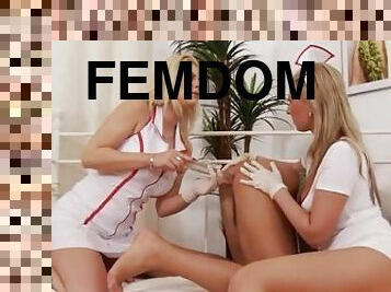 Nurse femdoms dildo fucking subject in erotic threesome