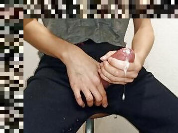 A young male masturbates his big dick with a frozen cube of sperm and cums