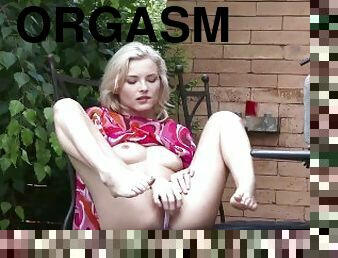 Cute blonde soaks her panties and masturbates to a wet orgasm