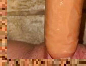 Teen has fun with dildo before shower