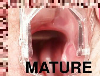 Peer deep inside a mature vagina