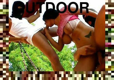 Two masked dudes stick their dicks in both of Alina's holes outdoor