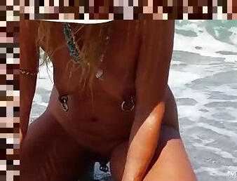 Nippleringlover - horny milf on nudist beach with multiple pussy piercings, extremely stretched nipple piercings