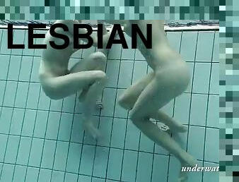 Loris and Okunewa  lesbians swimming underwater