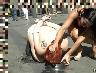 Dominant couple disgracing redhead in public