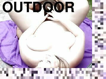 Chubby dominant gal facesitting guy outdoors
