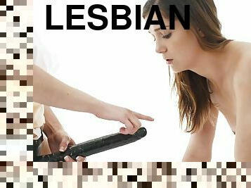 Lesbian rides rubber cock