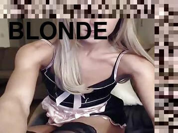 Blonde girl masturbates with a dildo