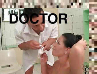 Doctor cums on her face and wipes it up