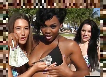 White and ebony chicks flash tits in exchange for money