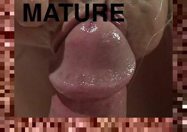 Impressive mature works the dick like a goddess