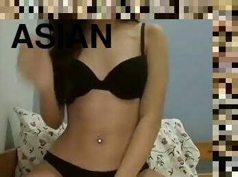 Asian girl masturbates on cam