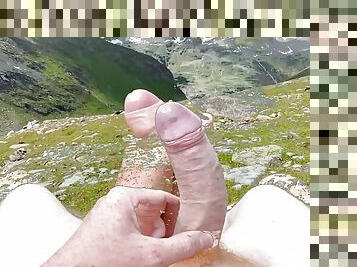 Wanking my big ginger cock on a green medow in the mountains