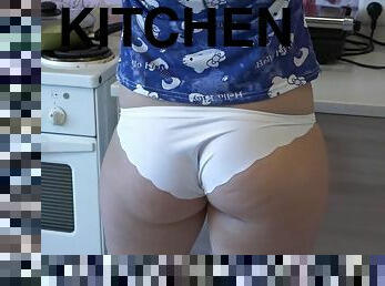 Masturbating in the kitchen, a mature slim housewife milf with a big beautiful booty.
