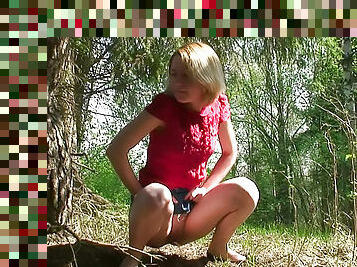 Sexy blouse on girl pissing in the woods
